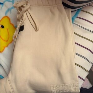ESSENTIALS SWEATPANT - EGG SHELL / XS **SMALL STAIN**